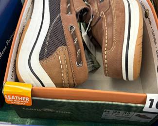 Men's leather boat shoes, new in box.
