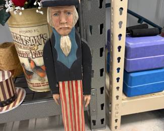 Wooden Uncle Sam figure.