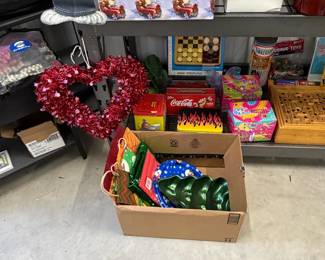Valentine and holiday decor, games, and gift boxes.