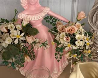 Vintage pink lady planter with florals.