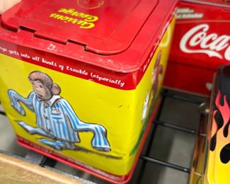 Coca-Cola collectible tins.