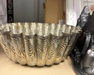 Metal bundt and gelatin molds.
