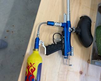 Paintball marker with air tank.