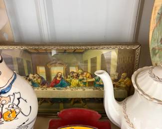 Last Supper print, chef decanter, and teapot.