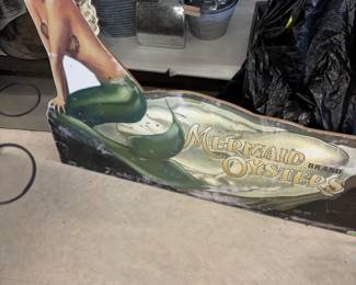 Mermaid wood sign.