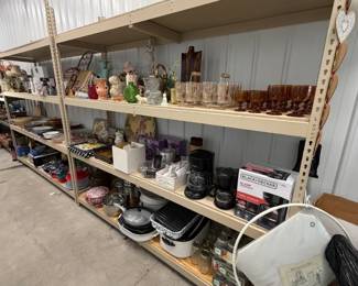 Shelves of housewares, cookware, and small appliances.