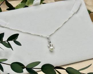 Diamonds and cultured pearl with 14k white gold