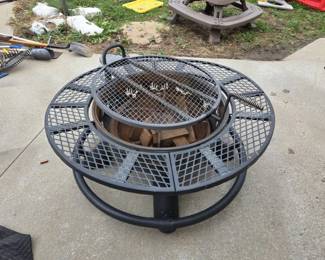 Round Metal Outdoor Fire Pit with Mesh Spark Screen Surrounding Table