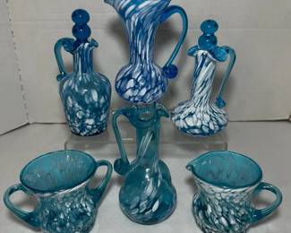 Hand Blown Blue and White Spatter Art Glass Pitchers, Cruets and Double Handled Vases - A set of hand blown blue and white spatter glass pieces including pitchers, cruets with blue ball stoppers, and double handled vases. A bright lot for art glass fans.