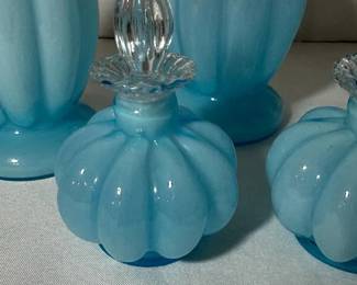 Fenton Blue Overlay Melon Rib Perfume Bottle with Clear Stopper - A Fenton blue overlay perfume bottle with a ribbed melon body and a clear faceted glass stopper. A pretty piece for a vanity or glass shelf.