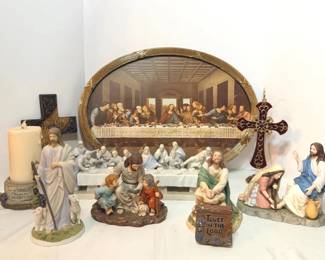Last Supper Framed Print, Tabletop Figurine, Religious Figurines and Cross Decor - An oval gold tone framed Last Supper print with a tabletop Last Supper figurine, four religious figurines including a shepherd with two lambs, a red jeweled cross, a dark wood Friends cross, a Trust in the Lord plaque, and a pillar candle holder with an I Am the Vine message. A good lot for a faith themed display.