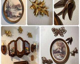 Oval Framed Landscape Prints, Wood Triple Mirror Shelf, Butterfly Plaques and Candle Sconces - An oval gold framed winter landscape print with a cottage and swans, brown butterfly and swallow wall plaques with a second oval framed print, brass leaf wall hangings, a wood triple mirror shelf with bird figurines, and a pair of wood wall candle sconces with glass shades. A good lot for cottage and vintage wall decor.