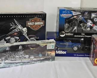 Revell Harley-Davidson, USS Arizona and AMT 1953 Corvette Model Kits with Miller Die-Cast Chopper and Pickup - A Revell SnapTite Harley-Davidson Heritage motorcycle kit, a Revell USS Arizona kit, an AMT 1953 Corvette kit, a Miller 75th Anniversary American Chopper die-cast motorcycle, and a Miller 1929 Roadster Pickup die-cast truck, all in their boxes. A good lot for model builders and die-cast collectors.