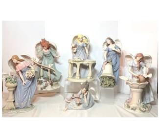 Pastel Porcelain Angel Figurines with Garden Columns, Gazebo and Bell - Six pastel angel figurines posed with floral garden columns, a gazebo, a bell, and a birdbath. A pretty group for a curio shelf.