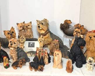 Yorkshire Terrier Figurine Collection with Schnauzers and Dachshunds - A big collection of Yorkie dog figurines, many with red bows, along with Schnauzer and Dachshund figurines and a Yorkie photo frame. A fun lot for dog lovers.