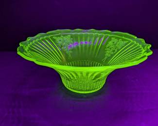 Lot 571: Uranium glass centerpiece bowl, glowing under UV light