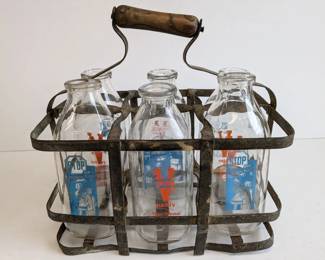 Lot 531: Virginia Dairy milk bottles in wire carrier