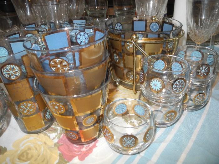 Very cool retro bar set....ice bucket, several sizes of matching glasses!
