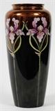 Lot#113, BELLEEK PAINTED PORCELAIN VASE, H 10", DIA 4"having a pink orchid design with copper to black ground, signed on underside;