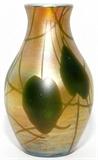 Lot#1062, L. C. TIFFANY GOLD FAVRILE GLASS VASE, C. 1920, H 8", DIA 4 1/2"Gourd form iridescent gold glass vase decorated with green vine motif.  Signed "L. C. Tiffany Favrile, 6546 N" (see additional photo).