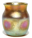 Lot#1066, L. C. TIFFANY GOLD FAVRILE GLASS LIQUEUR, H 2",Or cordial, with pinches sides having a pink hue.  Signed "L.C.T. Favrile" (see additional photo).