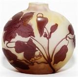 Lot#1100, GALLE CAMEO GLASS PERFUME BOTTLE, C. 1900, H 4 1/2", W 4 1/2"White frosted glass shaded yellow, carved floral motif accented in purple,  Signed "Galle" (see additional photo).