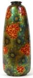 Lot#1102, ZSOLNAY EOSIN POTTERY VASE, C. 1910, H 10"Oblong shape with stylized flowering vine and starburst motifs in red, yellow, green and blue eosin glaze, marked with round raised seal along with shape number 8195, and numbers 36 and 48 (see additional photo).