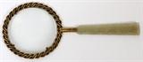 Lot#1195, JADE HANDLE MAGNIFYING GLASS, L 6"Carved and pierced jade handle with figural motif.