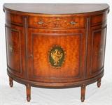 Lot#1330, HAND DECORATED MAHOGANY COMMODE, H 32", W 36", D 16": Having a central drawer above a single door which reveals one shelf.  Painted urn, flower and shell forms. Good condition.  JMF