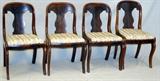 Lot#1481, AMERICAN EMPIRE MAHOGANY CHAIRS, C. 1840, FOUR,Each has baluster-form splat above an upholstered seat, raised on sabre legs, H.32 1/2" overall, W.18".Set of four matching side chairs. Flame figured mahogany.