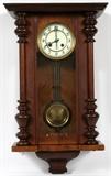 Lot#1500, GERMAN WALL CLOCK, C. 1900, H 26", W 16"Paschens Glockengong, with plain pendulum. Walnut case, chime clock. Circa 1900.
