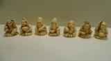 Seven Carved Ivory Japanese Netsuke Sitting Figures