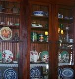 The built in cabinet is attached to the house and is not for sale but all of the china, etc. inside is for sale.