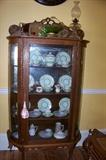 A beautiful curved glass, oak china cabinet