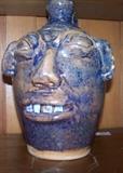 One of several B.B. Craig face jugs. Mr. Craig died in 2002 at the age of 88 and is known as the Dean of contemporary folk potters in N. Carolina. His pottery is in the permanent collection at the Smithsonian, the Mint Museum of Art in Charlotte, NC, and numerous other museums. He was honoredwith the National Folk Heritage Award by the National Endowment for the Arts in 1984.