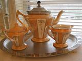Fraunfelter copper luster tea set including tray