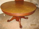 Antique paw foot tiger oak table