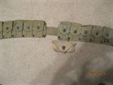 THIS IN IN THE ONE LOT BEING SOLD BY BID ONLY....World War II cartridge belt with first aid kit attachment