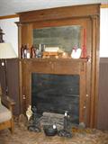 Antique oak mirrored firplace mantle w/ carved decoration