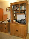 Computer armoire with two doors and swing-out bottom