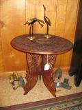 carved table, cast iron shoe last and irons