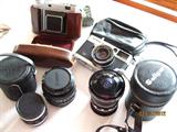 Vintage Kodak "Retina II", Olympus 35-ED, Soligor fish eye lens, Canon Promaster 50MM lens, Olympus Pen F lens.