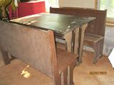 Mission-style table w/ 2 benches from breakfast nook in vintage house