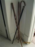 Walking canes, one carved folk art cane