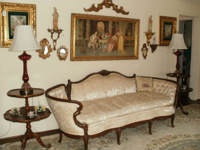 French sofa, red cut to clear lamps, two tier tables, framed bisque pictures, Italian gilt mirrors & sconces