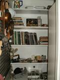 Cookbooks, copper pans, vintage kitchen utensils
