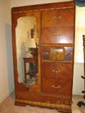 Waterfall mirrored chest armoire