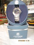 New in box : a TERRIBLE picture of Citizens Eco-driven men's wristwatch...never needs batteries