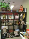 Bookcase/room divider full of treasures