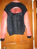 Wilson jacket made from actual Wilson football material, signed